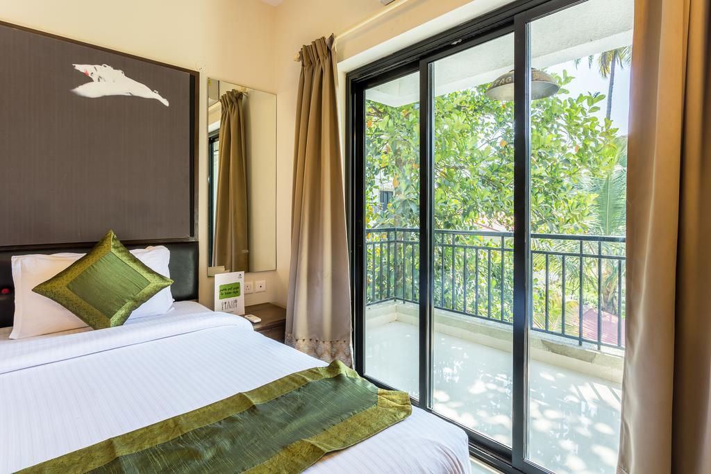 Treebo Trend Zeebo Suites Arpora Esterno foto