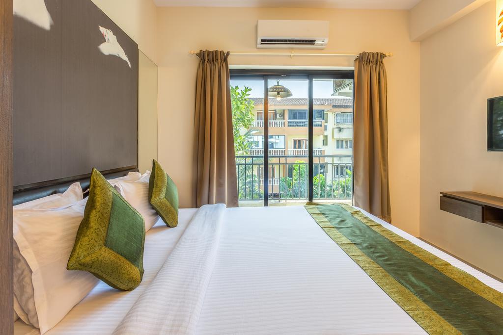 Treebo Trend Zeebo Suites Arpora Esterno foto