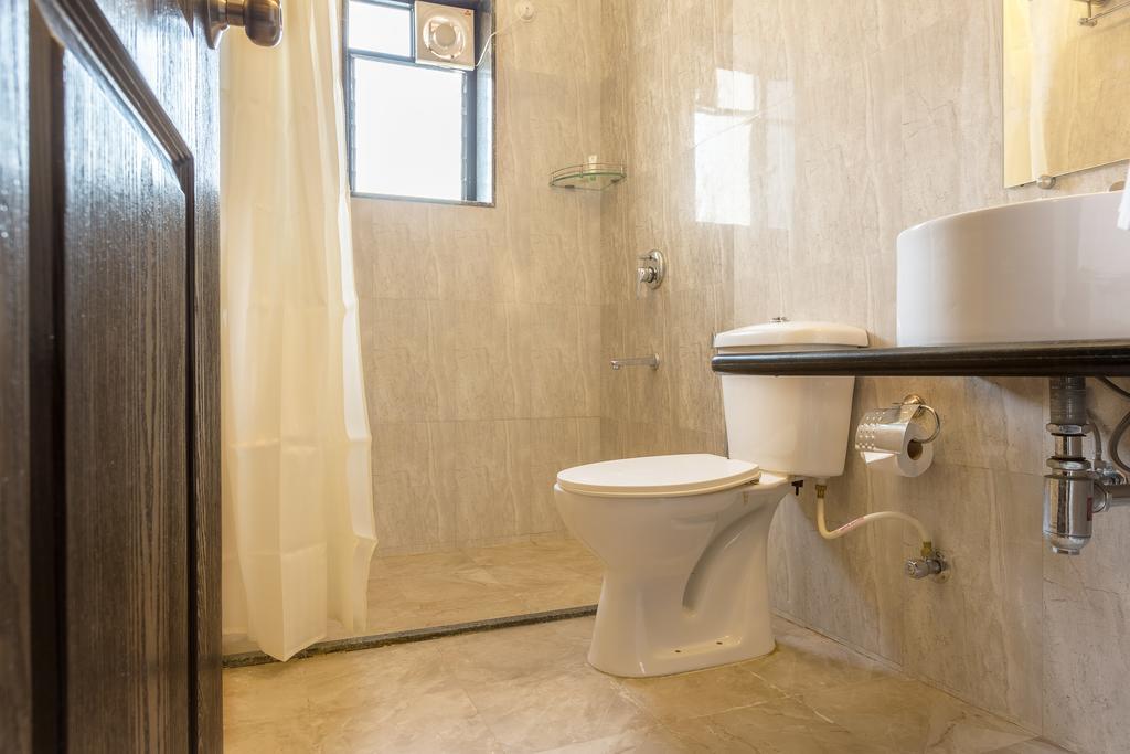 Treebo Trend Zeebo Suites Arpora Esterno foto