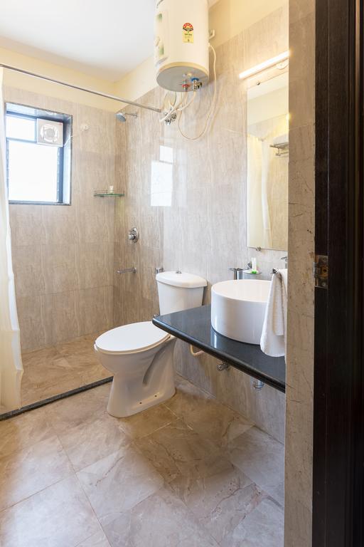 Treebo Trend Zeebo Suites Arpora Esterno foto